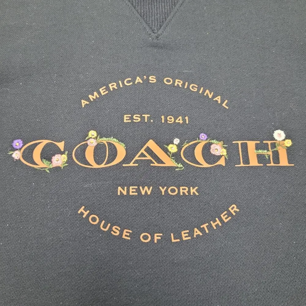 Coach black crew neck floral embroidered fleece pullover large logo